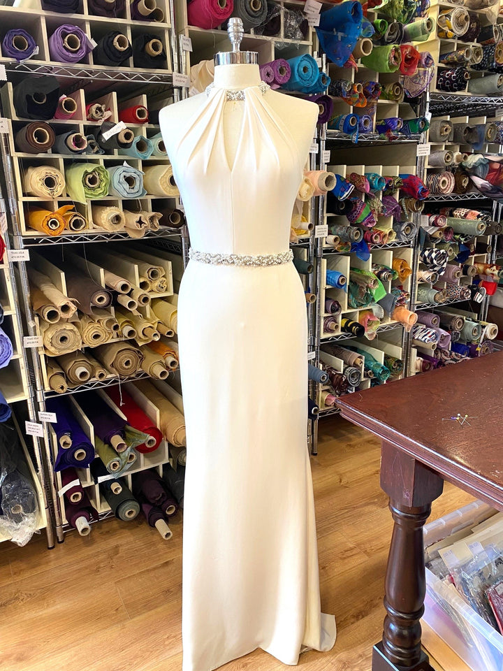 Winter White Treble Silk Crepe Full Length Bridal Gown. Halter Neck Line with Beaded Detail